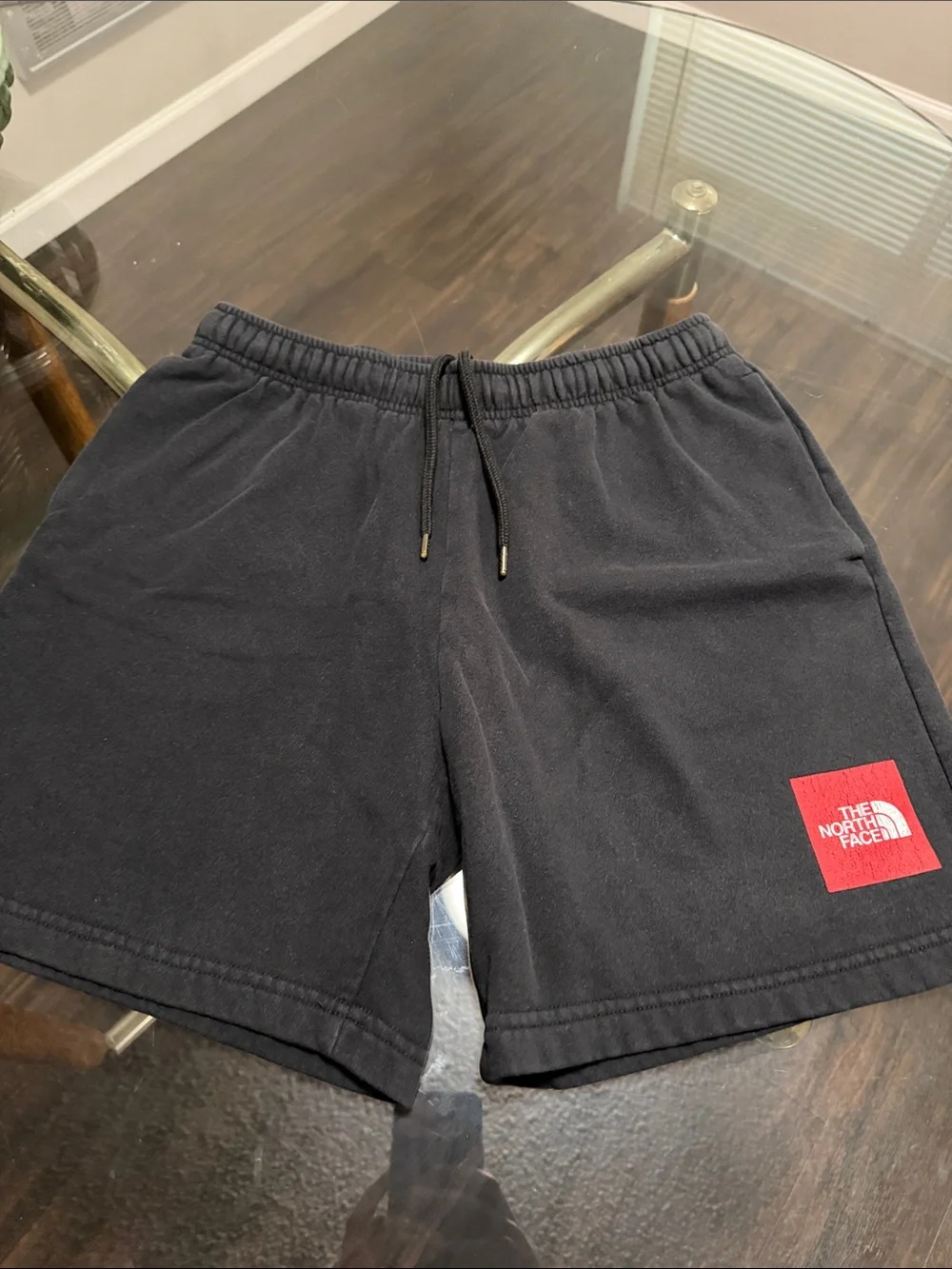 The North Face Men’s Black Athletic Shorts with Red Logo Patch 6”